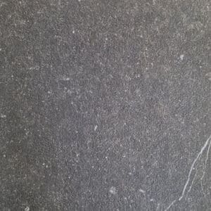 A close-up of the 600x600 black outdoor floor tile showing the Genus Home Nero Black finish and textured anti-slip surface.